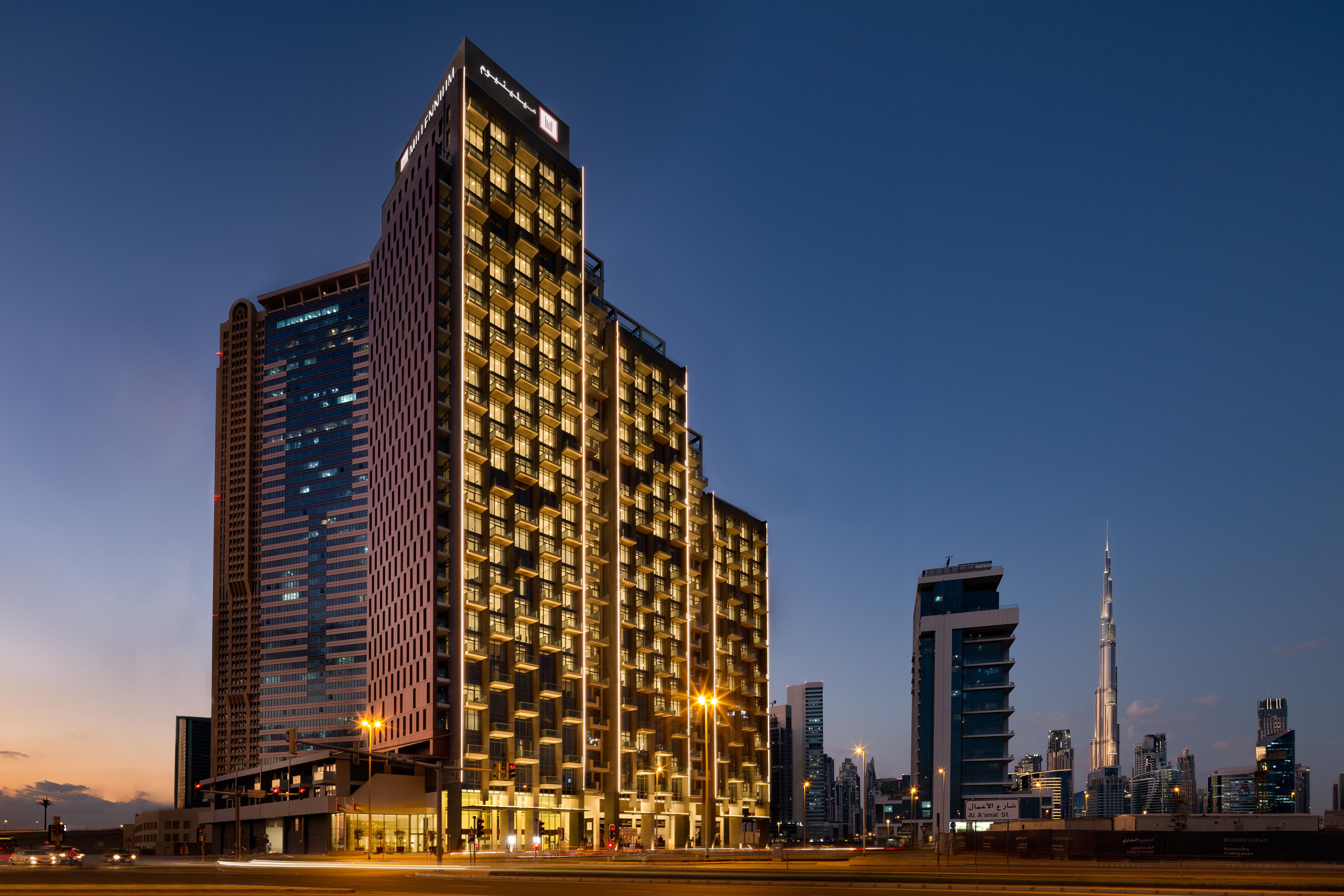 Millennium Atria Business Bay Aparthotel Dubai Exterior photo The hotel at night